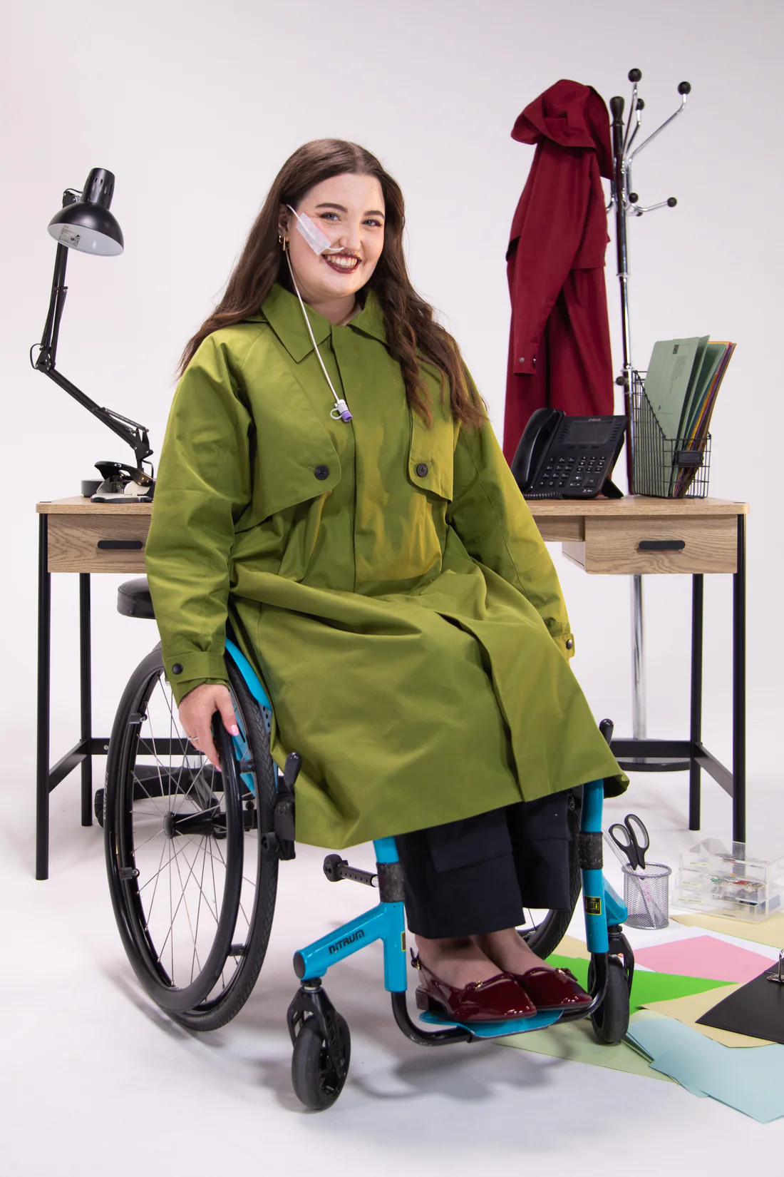 Woman wears long moss green